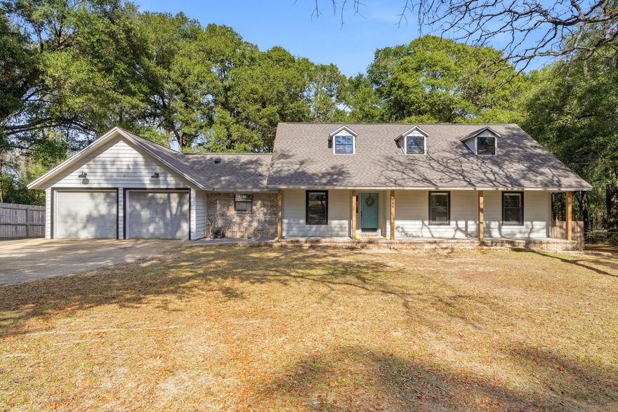 Welcome to this charming 3 bedroom, 2 bathroom, ranch style home in the established Kennedy Lakes neighborhood in Crestview! Good location for military commuters to Duke Field or Eglin AFB! With no HOA! Nestled on a large 0.94 acre lot, this home features all newer major systems - including a 2020 roof, 2021 high-efficiency HVAC with heat pump, and a 2021 high-efficiency water heater. Inside, this home offers a functional floor plan with plenty of character - featuring a large step down living room with wood burning fireplace, a formal dining area, and kitchen with large, custom-made butcher block island. The opposite side of the home has the spare bathroom and 3 large bedrooms, including the primary bedroom with ensuite and a bay window offering a view of the expansive backyard.  Just off the kitchen is a door to the backyard deck - just waiting for you to fire up the grill and entertain! The 2 car garage features a 220v 50 amp outlet, ideal for high powered tools, heavy duty shop equipment, or electric vehicle charging. On the side of the house, just off the garage, the property features an extended asphalt driveway - perfect for additional vehicles, storing your boat, or parking your RV! With an added bonus for the new owner - the power lines will be underground on the whole street!