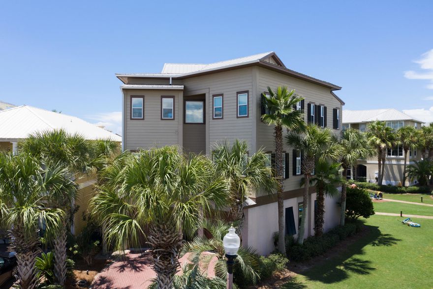 Welcome to ''Lofty Ideas'' a top floor poolside paradise. This is a unique opportunity to own a condo in a building with no shared walls overlooking the gorgeous 12,000 sq ft Seacrest Beach Lagoon Pool, in a building with only two units. Enjoy the beautiful vistas of the palms and fountains in the pool. The large open concept great room has spectacular views. French doors lead to a lovely balcony and provides the perfect view to enjoy your morning coffee or to ''wine'' down at sunset. The unit is updated with new paint, fresh furnishings and accessories, and new flooring. Fully equipped kitchen, with bar seating, and a dining table that can seat 10. Comfortable seating in the living area for a large family to gather. Large King Master, with views of pool and access to the balcony.