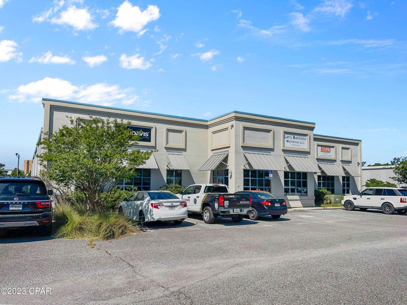 Located in Beach Commerce Park and just minutes from South Walton, the Airport, etc.. Over 3,400 square feet of quality finished offices, multiple conference rooms, training rooms, reception area, and 2 ADA restrooms. 100% heated and cooled. Clear space warehouse space with 16 ft. eaves, dock-height loading on the east-side and an oversized street-level rollup door (+/-14'H x 18'W) in the back, dock-height loading ramp on the side, large secure outside fenced and graveled area for additional parking and storage. The existing tenant, Paul Davis Restoration, is expanding and moving down the street at the end of July.