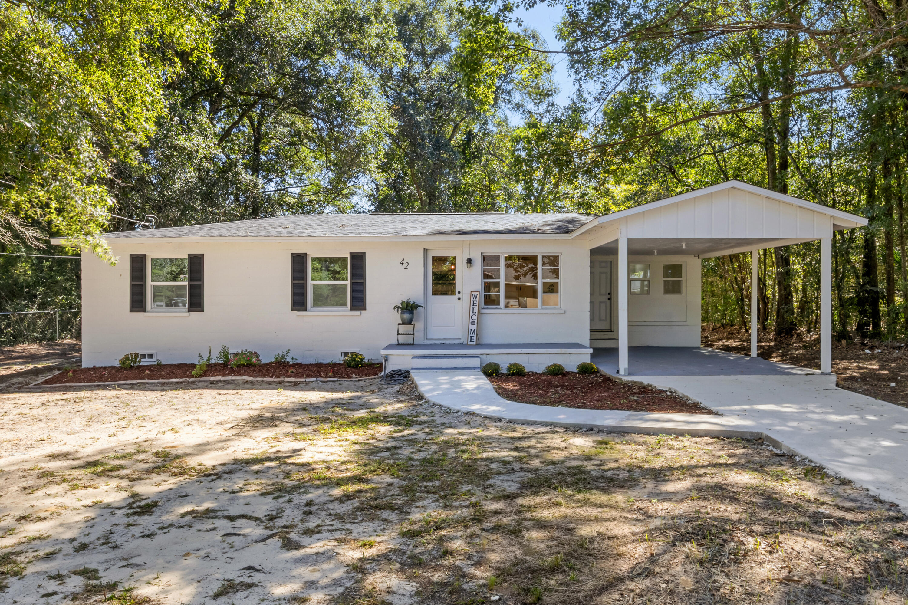 Completely remodeled 4 bedroom, 2 bath home in the heart of DeFuniak Springs! This move-in-ready home features a brand-new kitchen with white cabinetry, subway tile backsplash, stainless steel appliances, and a spacious island. The beautiful private master suite with its own bath creates a relaxing retreat, while fresh flooring, updated lighting, and modern finishes throughout make this home shine. Enjoy the covered carport, spacious yard, and convenient location just minutes from schools, shopping, dining, and historic downtown DeFuniak Springs. Step inside this fully renovated home where modern updates meet comfortable living! The open-concept kitchen features new cabinetry, subway tile backsplash, stainless steel appliances, and a spacious island perfect for casual dining or entertaining. Beautiful private master suite offers a relaxing retreat with its own bathroom, while three additional bedrooms provide plenty of space for family, guests, or a home office.
This home also features new flooring, fresh interior and exterior paint, updated lighting fixtures, and modern finishes throughout. Outside, enjoy a covered carport and a spacious yard ready for your landscaping touches.
Located just minutes from historic downtown DeFuniak Springs, schools, shopping, and dining, and with easy access to Highway 90 and I-10, this home offers both comfort and convenience. With everything brand-new and move-in ready, this property is perfect for first-time homebuyers, growing families, or anyone seeking a beautifully updated home at an incredible value.