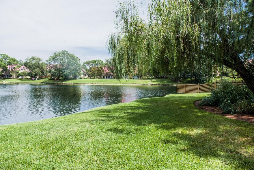 Move in, start playing! Over $100,000 in quality, professional interior design and improvements, including replacing all water lines to modern standards, removing popcorn ceilings, upgrading cabinets, remodeling the baths and kitchen, replacing outside fencing and gate, and replacing upstairs furnace/AC were made according to the owners. This beautifully decorated Beachwalk Villa is immaculate and offered furnished and ready to enjoy. As you step into the foyer you are greeted by tall ceilings and you at once recognize attention to detail inspired by the love of Sandestin Beach Resort. This home includes additional living space not found in the typical Windslow floor plan. The attic space adjoining the loft has been transformed into a cozy bedroom ideal for children, which is the third bedroom. The kitchen is open to the living with vaulted ceilings and a bright, airy dining niche for effortless entertaining. Enjoy morning coffee on your open terrace overlooking the lagoon lake and lush landscape. There are ample windows in the home bringing the outdoors in from almost every point of view. Don't miss your opportunity to own this coveted "end" Beachwalk Villa in a most desirable location sitting on the lake surrounded by nature steps from the pool. The owners share it is ideal for those who enjoy an active lifestyle within the resort.  Soothing gulf breezes beckon you to take a short walk or golf cart ride to the beach. Stroll to the Market Shops of Sandestin for fine dining inside or out at Bistro Bijoux. Casual dining at Dig and fabulous take out.  Plan an afternoon for a variety of shopping and spa services in the resort. The 2,400 acre gated community of Sandestin offers access to the beach, miles of walking and bike trails, four golf courses, tennis center, and 98 slip marina with restaurant, shopping, fitness and spas.  Truly 5123 Beachwalk Villa is a special place to call home at Sandestin Beach Resort.  Make your plans today to see this beautiful pure second home Beachwalk villa and begin enjoying life at the beach! Easy to see!