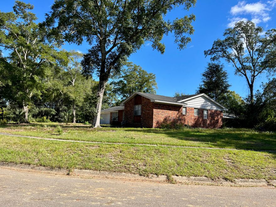 This is an excellent opportunity to buy a fixer-upper in the majestic Forest Park/Kenwood Subdivision.  This was a lovely place in her prime and is ready for updating and a new owner to make her great again. Built with Chicago brick on a vast corner lot right across from Bass Lake.  The back addition is a large room/den with an ensuite full bathroom and a utility room with a sink.Could you be up for the challenge to make this place the prettiest home on the block?