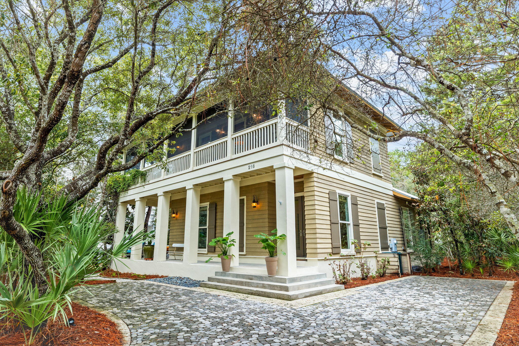 Welcome to 216 Wilderness Way in the gated Western Lake neighborhood of Lake Place at Grayton Beach with community dock and swimming pool.  Live in a private enclave with no short-term rentals where nature beckons you to enjoy sunsets over Western Lake, biking, walking, kayaking and stand-up paddle boarding.  Only forty-nine platted homesites on approximately 20 acres are bordered by state park and Western Lake making this a sought-after enclave for full time and second home residents.  This beautiful 3 bedroom, 2.5 bath home is nestled on a treed lot with twisted oaks and tall pines. Two graciously sized wrap around porches on each level provide peaceful ''porch-style'' outdoor living amidst nature and captures southern breezes.  A list of extensive improvements is available, naming a few includes upgrading the kitchen, remodeling the master bath and guest baths, customizing the pantry and master closet, fresh exterior paint and much more! As you ascend the staircase you are welcomed to the main living area open floor plan which lets on to the screened porch with gas grill and is ideal for outdoor gatherings and dining.  The bright and airy kitchen draws the eye to the white painted cabinetry nearly reaching the ceiling while an expanse of countertop space and a customized pantry pleases the resident chef for stowing and organizing kitchen essentials.  You will enjoy a sense of seclusion yet convenience to the 30A bike path, beaches, shopping, walking to dining and the coastal towns of 30A, all while nestled away among nature. We invite you to experience this neighborhood and make an appointment to discover the beauty of 216 Wilderness Way at Lake Place at Grayton Beach.