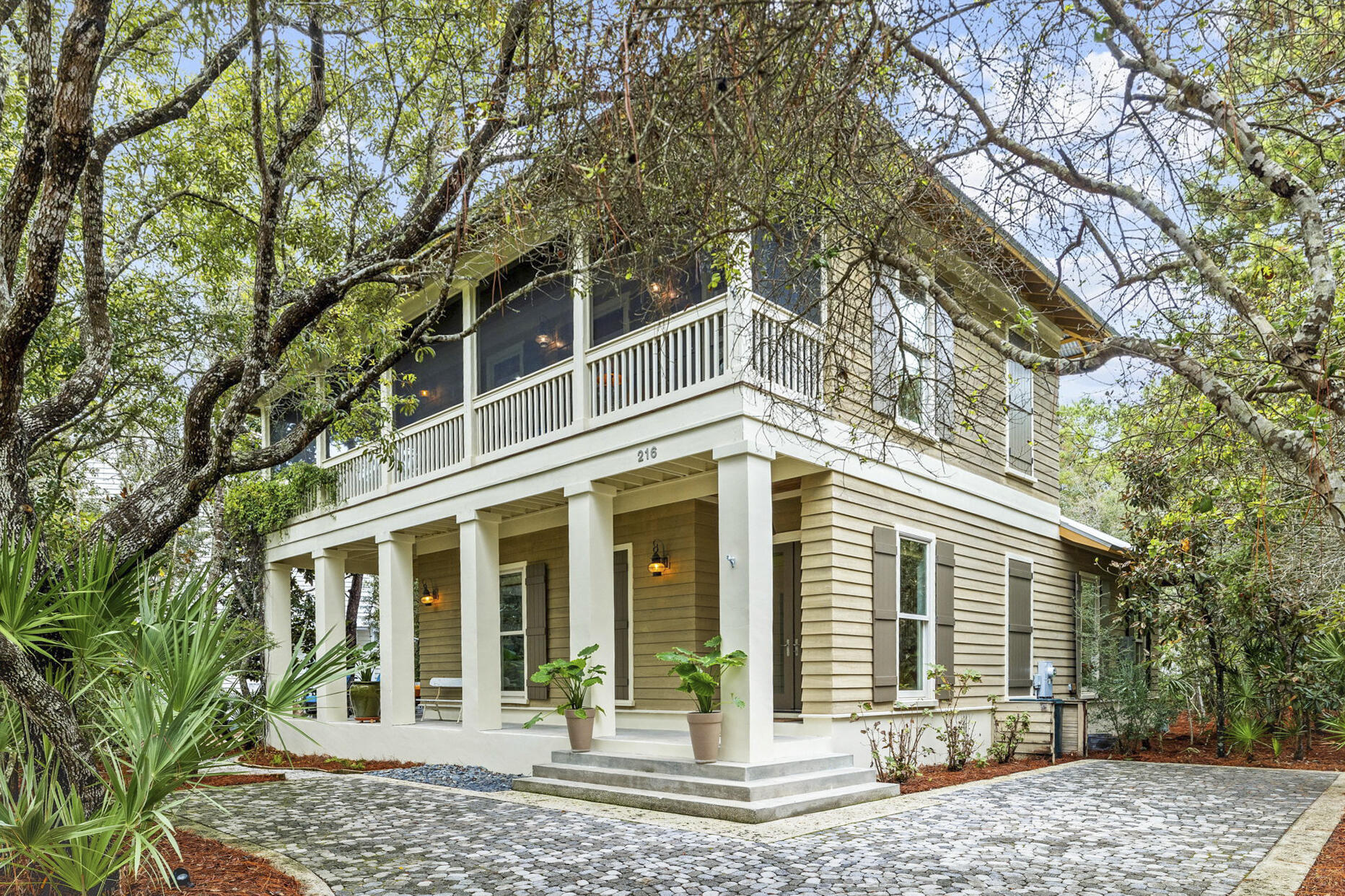 Welcome to 216 Wilderness Way in the gated Western Lake neighborhood of Lake Place at Grayton Beach with community dock and swimming pool. Live in a private enclave with no short-term rentals where nature beckons you to enjoy sunsets over Western Lake, biking, walking, kayaking and stand-up paddle boarding. Only forty-nine platted homesites on approximately 20 acres are bordered by state park and Western Lake making this a sought-after enclave for full time and second home residents. Architect, Tammy Massey, created conceptual plans to increase home to a 4 bedroom with extended living area and a garage. Plans available upon request. This beautiful 3 bedroom, 2.5 bath home is nestled on a treed lot with twisted oaks and tall pines. Two graciously sized wrap around porches on each level provide peaceful ''porch-style'' outdoor living amidst nature and captures southern breezes. A list of extensive improvements is available, naming a few includes upgrading the kitchen, remodeling the master bath and guest baths, customizing the pantry and master closet, fresh exterior paint and much more! As you ascend the staircase you are welcomed to the main living area open floor plan which lets on to the screened porch with gas grill and is ideal for outdoor gatherings and dining. The bright and airy kitchen draws the eye to the white painted cabinetry nearly reaching the ceiling while an expanse of countertop space and a customized pantry pleases the resident chef for stowing and organizing kitchen essentials. You will enjoy a sense of seclusion yet convenience to the 30A bike path, beaches, shopping, walking to dining and the coastal towns of 30A, all while nestled away among nature. We invite you to experience this neighborhood and make an appointment to discover the beauty of 216 Wilderness Way at Lake Place at Grayton Beach.