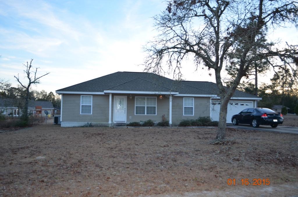 Newer home located in the heart of Defuniak Springs. Home has all vinyl siding, 2 car garage, 3 bedrooms, 2 baths and is approx 1260 sf. Home appears to be in avg condition and is currently occupied. Do NOT disturb occupant. It is a criminal offense to trespass on this property. Call today to find out more about this opportunity.