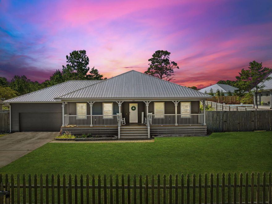 This is the custom-built home you've been looking for and its priced to sell! Just minutes away from 30A, a short walk to the beach, and surrounded by the dining and shopping that helped make South Walton one of the most desirable areas to live. This beautiful home is the perfect full-time residence or second home. It features gorgeous vaulted, beamed ceilings, custom cabinetry, and luxury LVP flooring throughout. The open-concept Chef-Inspired kitchen along with the oversized Great Room makes the perfect home for creating those special memories that will last forever. The attached garage is spacious enough for two full-sized cars and a golf cart! A screened-in back porch and privacy-fenced yard provide endless opportunities to design your very own outdoor sanctuary!