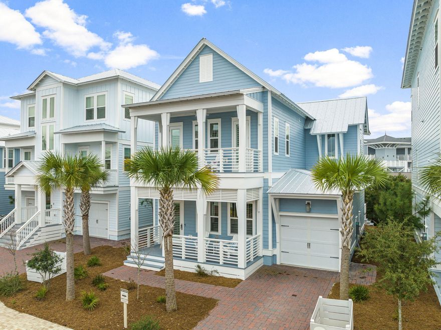 Luxury abounds in this beautifully appointed coastal home. Fully furnished to enjoy as a second home or incredible investment opportunity. Ideally situated on 30A, this home puts you in the epicenter of activity, while providing the peace and tranquility only a view of the sunset and waves can provide. The soaring 14-foot ceilings welcome you into an elegant and spacious family room with custom shutters, hardwood floors, and charming shiplap accent walls throughout. The Laguna floorplan encourages family gatherings with two master suites, one located conveniently on the first floor and the other on the second floor with a large balcony and gulf view.  Enjoy hours of fun with friends and family on the custom extended back patio.