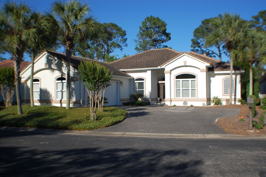 Beautifully Renovated Ranch with views and more views. This is the listing you've been waiting to call home in gated Sunset Beach. Completely updated, open floor plan, spacious interior with a view that will make you want to entertain at home (10 acre lakefront and 2 golf fairways). New modern patio features incredible gas firepit and outside cooking area. Gourmet kitchen features, solid surface counters, stainless steel appliance, counter depth fridge, warming drawer, and double convection ovens. New travertine flooring throughout public living areas and new hardwoods in all bedrooms. The Great room features new built-ins, new fireplace mantle and new gas logs. The Master Suite features His and Her closets and a beautiful remodeled bath, butted glass and brushed steel with modern appeal.