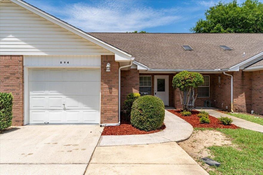 Welcome to this spacious townhouse offering a light-filled living experience with a stunning cathedral ceiling in the living room. The open layout seamlessly connects the living room to the dining area and kitchen, creating a harmonious flow for daily living and entertaining. The first floor features a generously sized bedroom and a full bathroom, providing convenience and accessibility. Upstairs, discover two large bedrooms and another spacious full bathroom, offering ample room for relaxation and privacy.  Laundry connections are situated in the garage, optimizing space and functionality. This unit is move-in ready, showcasing a well-maintained interior and a comfortable atmosphere throughout. Full repaint, flooring, kitchen cabinets have been replaced in the last few weeks. Don't miss out on this opportunity to own a townhouse that combines spacious living areas with a welcoming ambiance in a prime location.