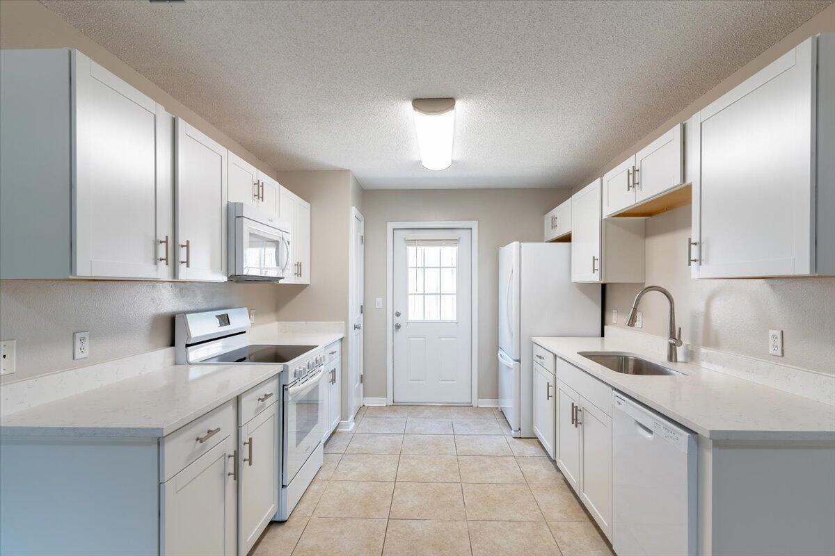 CAMBRIDGE VILLAGE T/H - Residential