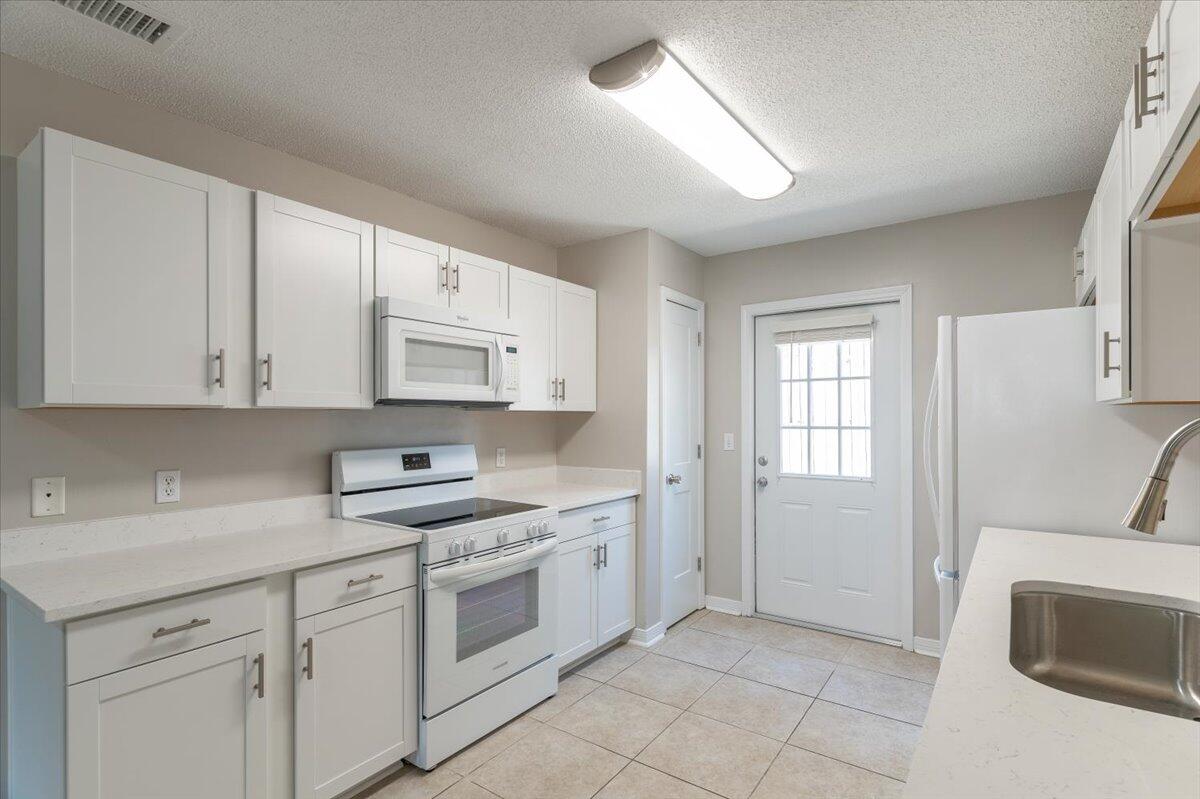 CAMBRIDGE VILLAGE T/H - Residential