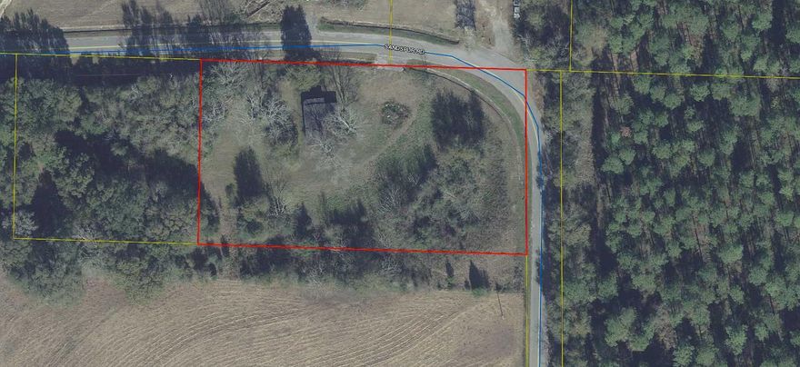 2.2 acres partially cleared.  New home or mobile home allowed.  Buyer to remove older structure built in 1930.  No value for the house.  Buyer to remove.  Survey will be needed.  Seller will consider owner financing with full price offer and  one-third down.  'THIS IS NOT A FLIPPER HOUSE DEAL'.  No records of septic or well.