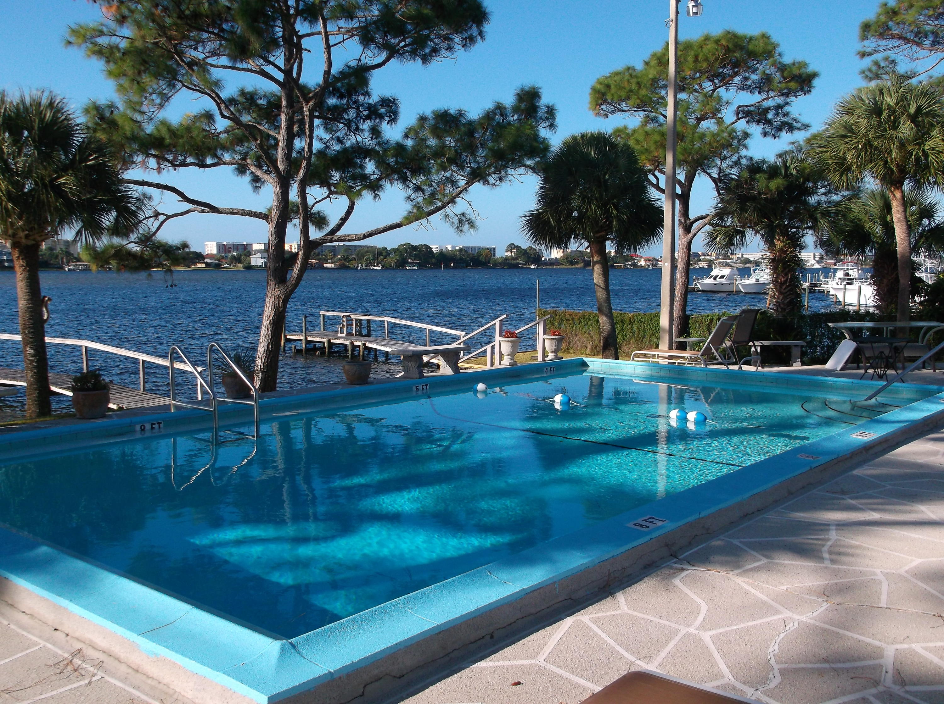 SMALL WATERFRONT COMPLEX OF 20 TOWNHOMES. GOOD LOCATION TO ENJOY ALL THE ''DOWNTOWN'' ACTIVITIES. COMPLEX HAS 150FT OF PRIVATE WATERFRONT GROUNDS WITH 2 DOCKS AND A WATERFRONT POOL. NEW ROOF WAS COMPLETED END OF SEPT 2015. SALTILLO TILE FLOORS IN LIVING ROOM, DINING ROOM, 1st FLOOR BATH & FOYER/HALLWAY. FRENCH DOORS LEAD FROM LIVING ROOM TO PRIVATE REAR PATIO. MASTER BEDROOM HAS WALK IN CLOSET. STROLL DOWN TO THE DOCK AND WATCH THE SUNSET. TENANT OCCUPIED, SEE AGENT REMARKS TO SHOW.