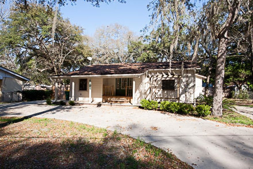 Features a huge open floor plan so that no one gets left out of the fun. The large island kitchen seats 6 adults at the bar in front of the range top for hibachi style entertainment. 5 bedrooms allows for the growing family and/or guests plenty of room to spread out. With 3 full baths you will never be late to that special event or have to wait your turn. There's a large privacy fenced, shaded yard, and if that's not enough room for you, the park and boat launch are less than a block away. No more worries about parking or backing into the street. The circle drive provides convenience and safety. Also are parking areas to both sides of the property possibly for your boat or RV.