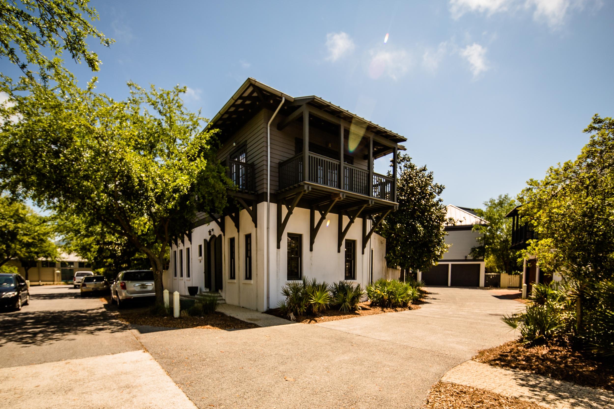 Gary Justiss thought of everything when he designed this wonderful family home!Built on one of the largest lots in ROSEMARY BEACH in a FABULOUS LOCATION, it is near tennis, indoor pool, east long green park, and a short stroll to the BEACH. Entering the front door, you step into a 2-STORY FOYER with an internal balcony that opens onto a COURTYARD with French doors. A FORMAL LIVING ROOM provides room for adult conversation. The SPACIOUS FAMILY ROOM has kitchen, dining and living space with a RAISED HEARTH FIREPLACE. Kitchen has a long STAINLESS ISLAND & KITCHENAID STAINLESS APPLIANCES,5 burner gas cook-top, pantry & built-in bar cabinet. French doors open onto the courtyard with soothing fountain. PEACOCK PAVER flooring throughout the first floor is cool and durable.