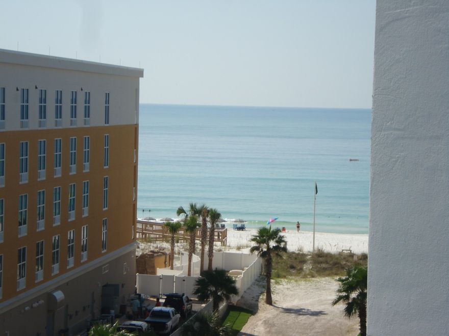 Great views of Intercoastal and Bay from this 6th floor unit. View of gulf from end of balcony and master bedroom. Best view of Sunrise! Enjoy all the amenities of Waterscape and then retreat to unit for privacy and quiet. This is a great rental or primary home. Gross rental 2016 $36,687;Gross rental 2017 $40,237. 2018 approx.$ 44,000) AC replaced Feb. 2015. Amenities include: Lazy river, 2 pools, 2 hot tubs, 10 gas grills, fitness center, kiddie play area with wading pool, 490' of beach front. Covered parking in garage on 6th floor, on site management; Unit is bright and colorful with new wicker furniture on balcony. Just right for relaxing. Snowbird, but I will make appt. to show. Best Buy!