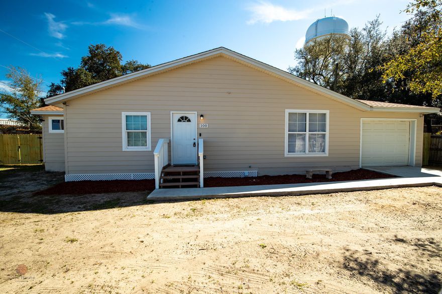 Back on Market no fault of the seller This beautiful, fully ranch-style 3bedroom, 2 bathroom home sits on nearly 1/4 acre which gives your family a huge backyard for family gatherings or to even put in a man cave, she shed, or a MIL studio. The home features a gorgeous galley kitchen with a vaulted ceiling, white shaker cabinets, granite countertops, new LVP flooring, and brand new stainless steel appliances. The Master Bedroom has an ensuite bathroom and the home has LVP flooring and new tile throughout. Finally, the kitchen leads you through the double sliding glass door to your backyard patio to relax and unwind after a busy day. Even better, with your new Ring doorbell, you can be outside or even at work and still answer your front door.
