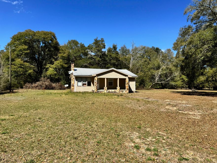 Gorgeous, nearly 3 acre property (final size to be determined by survey) in north Crestview. Property is zoned Mixed Use, per zoning dept. up to 4 homes per acre with Development Order. The home has potential, but needs quite a bit of work. The land, with it's gorgeous old oak trees, is the real star!