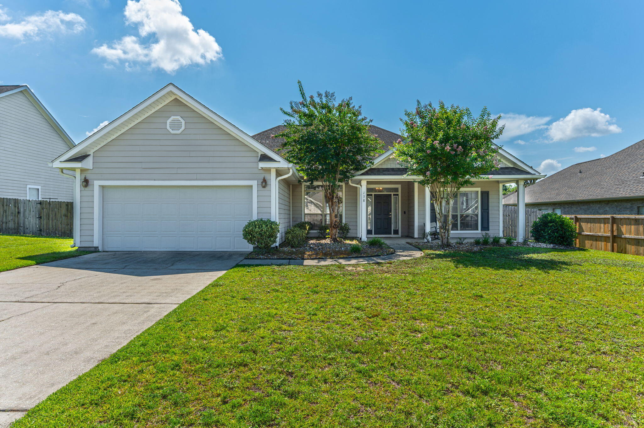 Located in Rolling Ridge, south of I10, minutes from Eglin AFB & Duke Field, this home offers both comfort & convenience. Inside, you'll find LVP flooring throughout, vaulted ceilings,& crown molding in living, dining & primary rooms. Kitchen features SS appliances & pretty tile backsplash, both bathrooms include tile sink accents. Primary suite boasts tray ceilings, large walk-in closet, an ensuite w separate tub & shower. Enjoy outdoor living w covered front porch, back patio & fenced back yard. Move-in ready, this home checks all the boxes-schedulet your showing today!