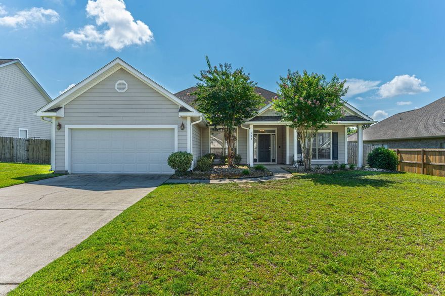 Located in Rolling Ridge, south of I10, minutes from Eglin AFB & Duke Field, this home offers both comfort & convenience.  Inside, you'll find LVP flooring throughout, vaulted ceilings,& crown molding in living, dining & primary rooms. Kitchen features SS appliances & pretty tile backsplash, both bathrooms include tile sink accents.  Primary suite boasts tray ceilings, large walk-in closet, an ensuite w separate tub & shower. Enjoy outdoor living w covered front porch, back patio & fenced back yard. Move-in ready, this home checks all the boxes-schedulet your showing today!
