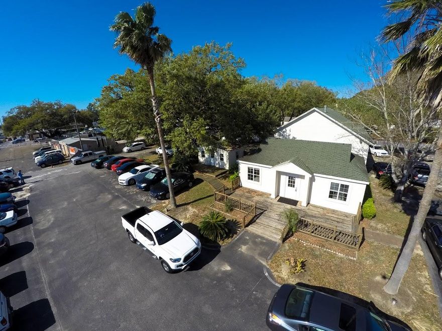 .67 Acre corner parcel with 175 feet of frontage on Beal Pkwy. Two buildings on the property consist of one 650 SQFT office building and 1,807 SQFT warehouse/garage with six rollup doors.