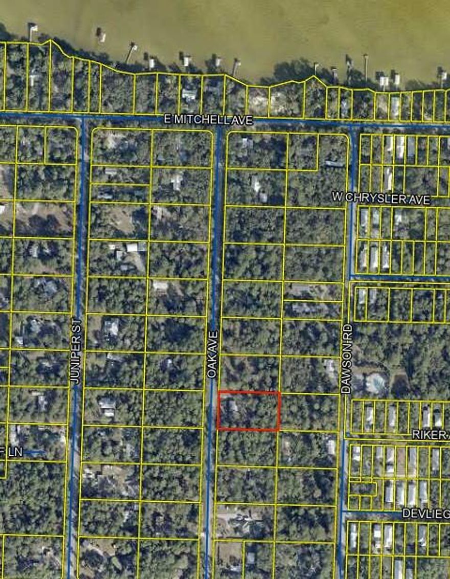 Welcome to 156 Oak Ave, a charming 3-bedroom, 2-bathroom mobile home nestled on a spacious 1-acre lot in Santa Rosa Beach, FL. This 1,620 sq ft residence features an open floor plan and a screened back porch, perfect for enjoying the serene surroundings. Located less than half a mile from the bay and just minutes from Hwy 30A, Grayton Beach, WaterColor, Seaside, and the Gulf of Mexico, this property offers both convenience and coastal charm. It's an ideal rental opportunity or a comfortable residence while you plan and build your dream home. With ample space for expansion, there's plenty of room to add a larger home, garage, pool, or garden. Proximity to schools, grocery stores, a hospital, shopping, and dining further enhances its appeal.