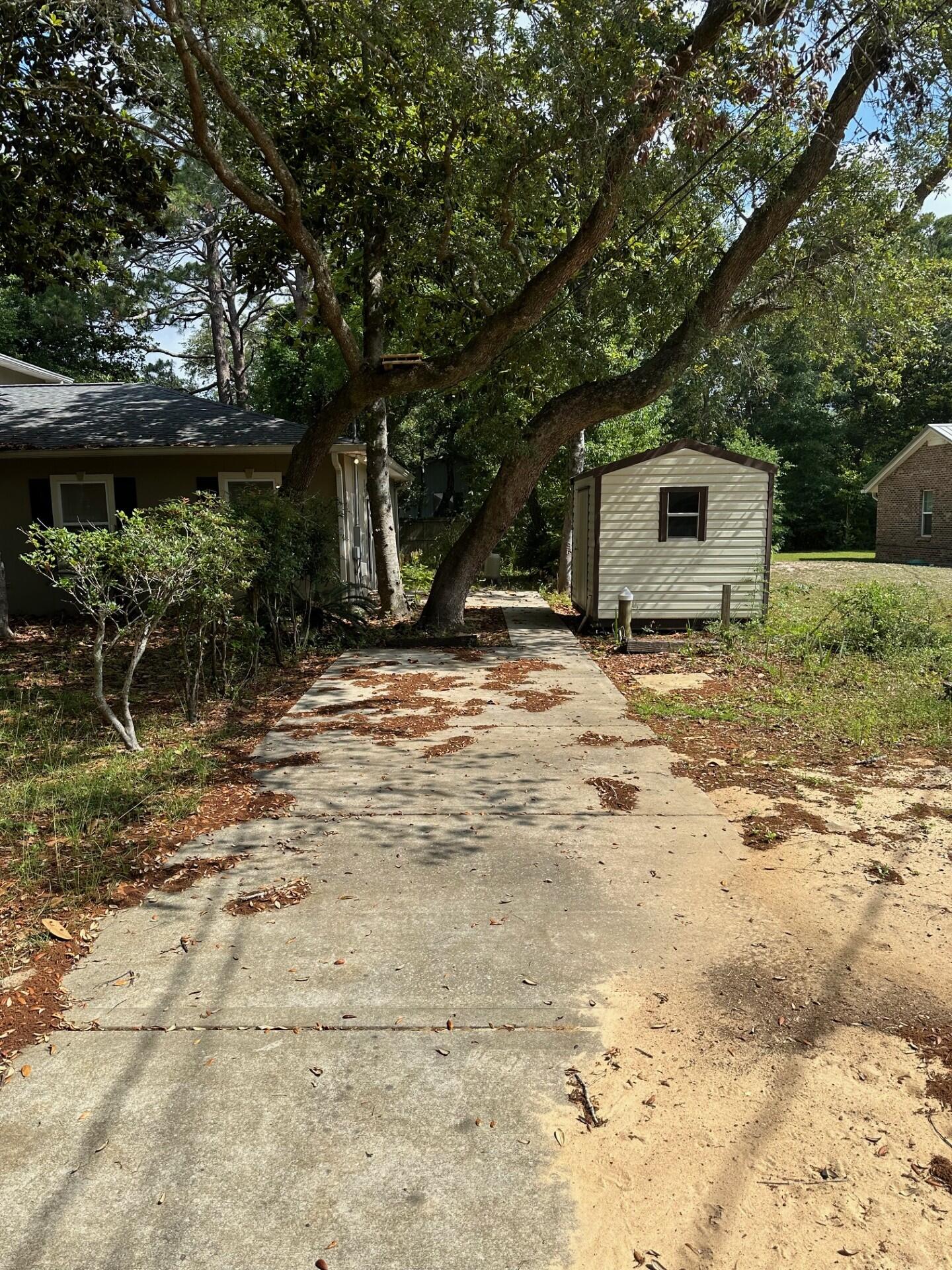 2 bedroom, 2 bath home nearby everything. Sacred Heart is just up the road, Walmart just 2 miles east, Sandestin just to the west, and the beach is just minutes away!!! Large RV/Boat Garage attached, but available for lease separately from the home. Electricity included in rent since garage is metered together with the home. Garage space will rent for $600/month. Storage use only, not a living space or for operating a business out of.