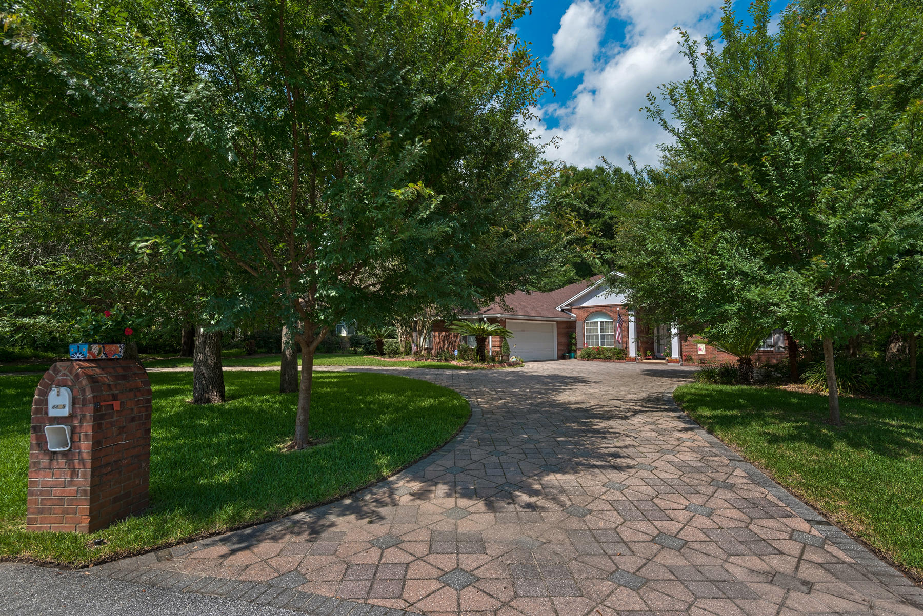Ideally located on a quiet cul de sac in the Rocky Bayou area, this secluded southern style home is surrounded by nature, set among a private oversized wooded lot. The spacious landscaped yard backs up to Eglin Reservation, forever remaining private and undeveloped. This turnkey, move-in ready home has been meticulously maintained and includes a new water heater, new HVAC unit, and a new roof installed in 2015. Solid hardwood floors are found in both the living room and kitchen. In the kitchen, you will find stainless steel appliances and gas range outfitted for the chef in the family. Continuing into the large master suite, featuring a double vanity sink, walk-in shower with separate soaking tub. This master suite also features a large walk-in closet with built-in storage. In addition to