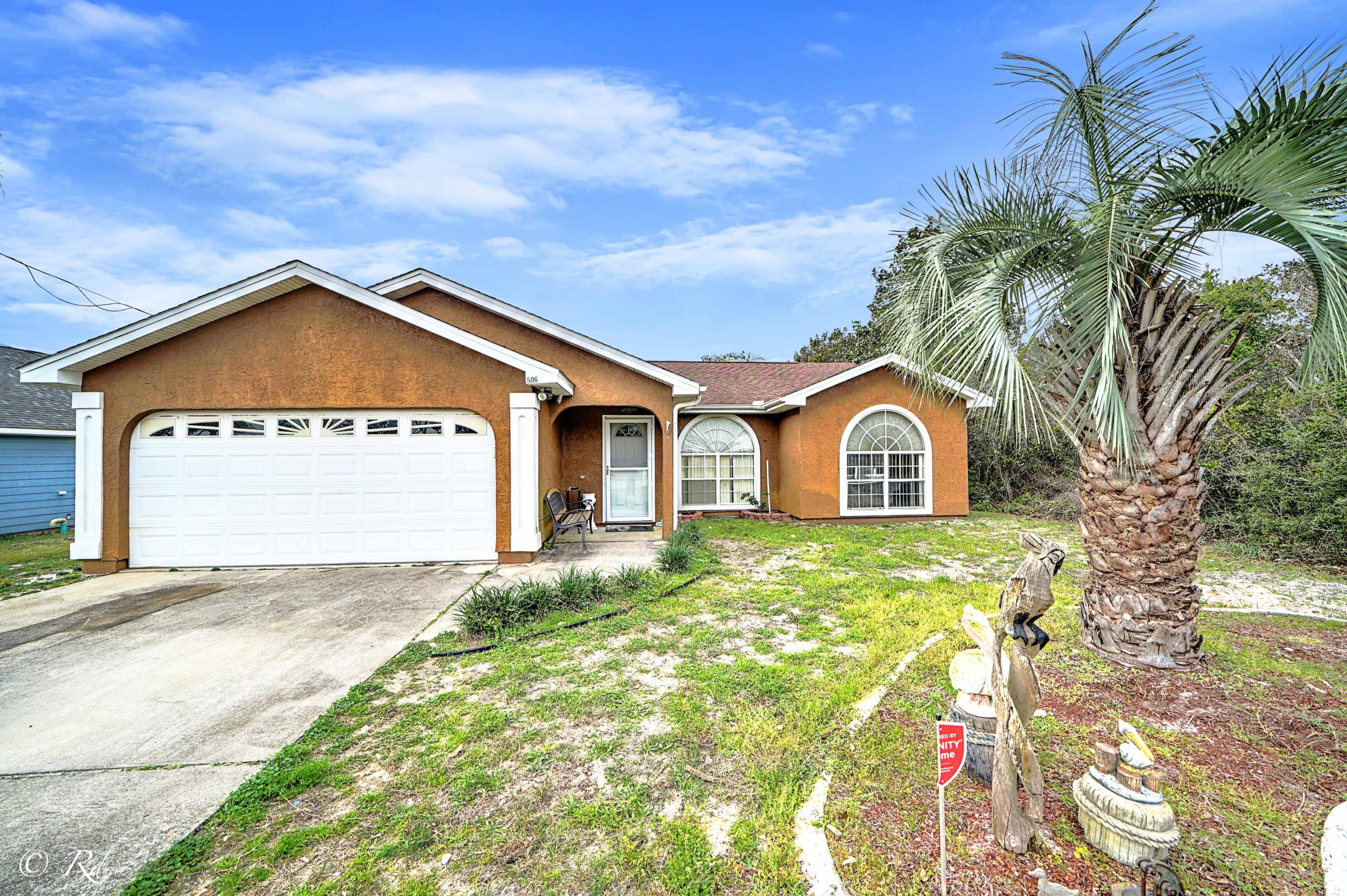 DON'T MISS THIS ONE! Two bloks from the gulf, salt water pool with screened enclosure, new hardwood floors throughout... what's not to love about this place. Three bedrooms, two bath split plan with room for everyone. And did we mention SALT WATER POOL with new pump and filter? This place has everything you need for your life at the beach.