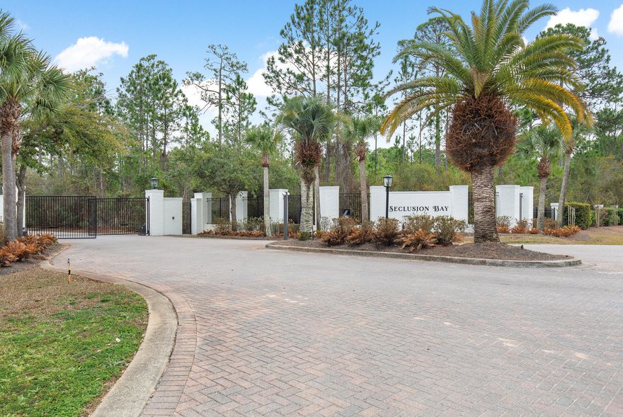 Experience the pinnacle of modern luxury with this elegant one-story residence nestled on a serene, tree-lined street in a highly sought-after gated neighborhood of Seclusion Bay in Santa Rosa Beach, FL. Located in the heart of coveted South Walton and moments from coastal Scenic Highway 30A, this exclusive community offers the best of what the Emerald Coast has to offer! This new-construction property sits on one of the largest lots available in the neighborhood, offering unparalleled comfort, style, and convenience. This 0.91 acre lot offers additional room to build a guest cottage, entertainment/rec space, greenhouse, boat garage, putting green, sport court, the possibilities are endless!  A grand iron entry door makes a bold statement as you approach the home, combining timeless elegance with exceptional durability and security. Designed for both relaxation and entertaining, this home features a split bedroom floor plan with a primary suite and three spacious guest rooms. Along with a versatile room just off the grand foyer that can serve as a dining room or office space.

At the heart of the home, a spacious open layout seamlessly connects the living room and kitchen, flowing effortlessly into the outdoor space. The kitchen boasts chef-inspired premium finishes and a massive walk-in pantry, offering abundant storage for all your culinary essentials. The kitchen is equipped with state-of-the-art Monogram Series appliances, renowned for their professional-grade performance and sleek design. These high-end appliances seamlessly blend form and function, elevating every culinary experience. 

The adjacent laundry room is impressively spacious, designed with functionality in mind to make daily tasks more efficient. Just one of many floorplan features in this thoughtfully designed home, showcasing the rare and effortless appeal of one-story living in our area. 

The luxurious primary suite, anchoring one side of the home, is a true sanctuary. It features two expansive walk-in closets with ample storage space and a spa-like bath complete with elegant designer tile, a soaking tub, and a custom walk-in shower with champagne bronze fixtures. This serene space invites you to unwind in unparalleled comfort. 

Beautiful engineered sugar oak wood floors run throughout the living areas, creating a warm and inviting ambiance. Each bathroom showcases exquisite designer tilework, including sophisticated marble and terrazzo finishes, paired with Kohler and Delta champagne bronze fixtures for a timeless and luxurious feel. High-end brass gold textured lighting fixtures further enhance the home's elegant aesthetic. 

Outside you'll discover your own private oasis. The beautifully landscaped backyard is highlighted by an inviting in-ground pool and brick firepit with seating perfect for gatherings or peaceful evenings under the stars, complemented by a covered patio outdoor kitchen. The oversized three-car garage offers ample space for vehicles, storage, or hobbies, ensuring all your needs are met.

This prestigious gated community provides exclusive access to the serene Choctawhatchee Bay, complete with a private community dock ideal for water activities and sunset views. With its prime location, thoughtful design, and luxurious features, this newly constructed masterpiece offers the perfect blend of elegance and modern convenience. 

Don't miss the opportunity to own this exceptional property. Schedule your private showing today!

