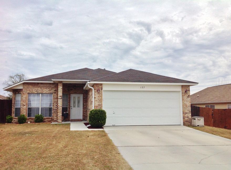 Pack your bags and call your mover! This home is absolutely MOVE in READY! This 3 bedroom 2 bath home checks off every box of your criteria! The Kitchen is HUGE with an island, tons of cabinets and walk in pantry! Large, open floor plan features a dining area, AND split bedroom floor plan! Freshly painted in neutral colors throughout. All new brushed nickel light fixtures, doorknobs and hardware. 3 Ton, Trane HVAC with UV light to protect from allergens, installed in 2012. Still under warranty. Also features variable speed! Homeowner's have done everything to be low maintenance, such as the rubber mulch (no bugs!), termite bond in place, and new garage door opener! Master bedroom suite, truly is a suite! It's HUGE! Master bath has double vanities, walk in closet and soaking tub.