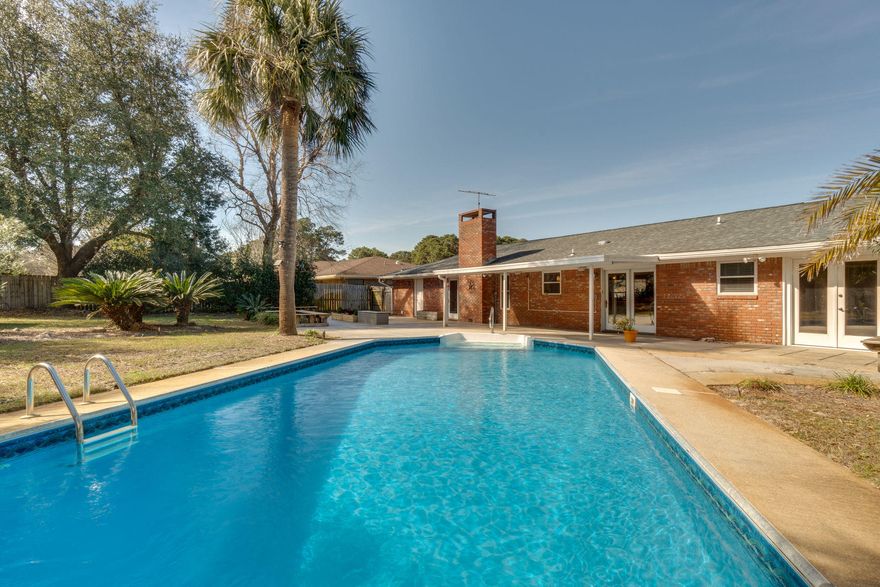 This all-brick home boasts an open floorplan w/oversized backyard in the highly sought after area of Indian Bayou. It offers a huge open kitchen w/2 breakfast bars, stainless steel LG appliances, endless cabinets & a set of French doors that lead to the pool. The living area has tiled flooring, wainscoting, built-in surround sound speakers, brick fireplace & a 2nd set of French doors that lead to your own private oasis. The extra-large master bedroom has a stunning, large walk-in closet w/custom shelving & French doors. The fenced backyard features a partially-covered deck w/outdoor speakers wired to the living area, an in-ground lighted pool, storage shed, & lush landscaping that's illuminated for your outdoor entertainment. See attached list of upgrades. Buyer to verify all information.