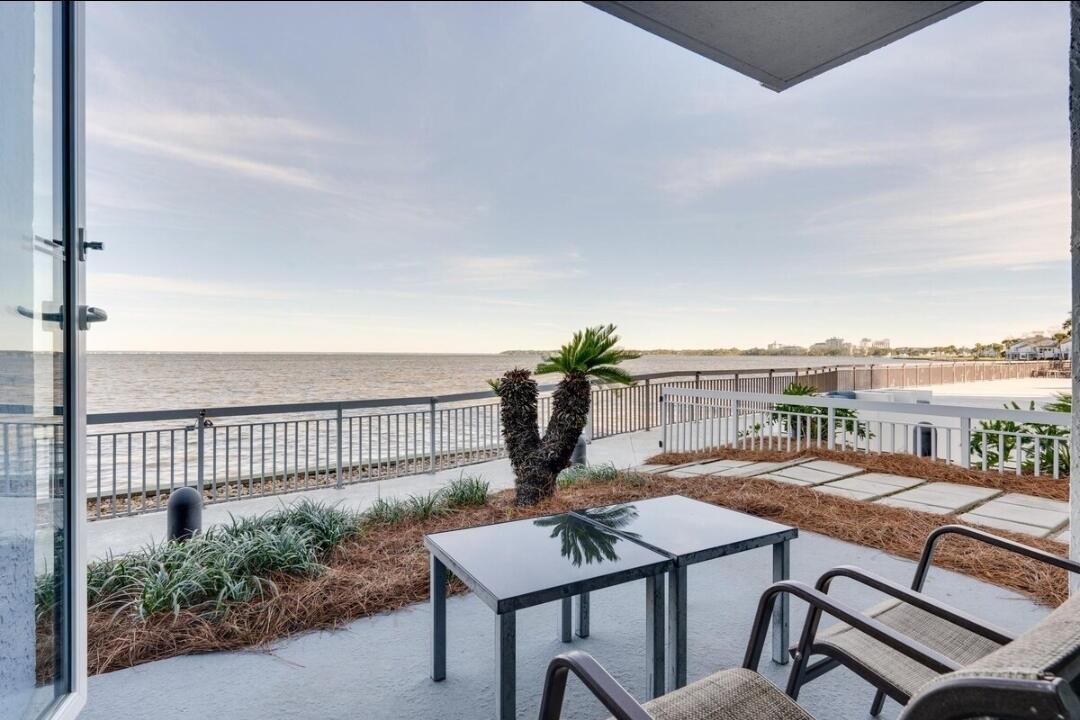 Waterfront Bliss in San Destin - Bayside Condo Welcome to your beautifully updated 1-bedroom waterfront condo in the highly sought-after Bayside community. Wake up each morning in your king bedroom suite to breathtaking bay views and step through the sliding doors onto your private patio - the perfect spot for coffee and a front-row seat to the sunrise.This condo combines comfort and lifestyle with access to incredible resort-style amenities: a huge pool, basketball courts, rock climbing, and so much more. Inside, you'll enjoy a stylishly updated interior designed for relaxation and modern coastal living.Whether you're looking for a personal getaway or a strong vacation rental investment, this condo offers the perfect blend of location, amenities, and waterfront views.