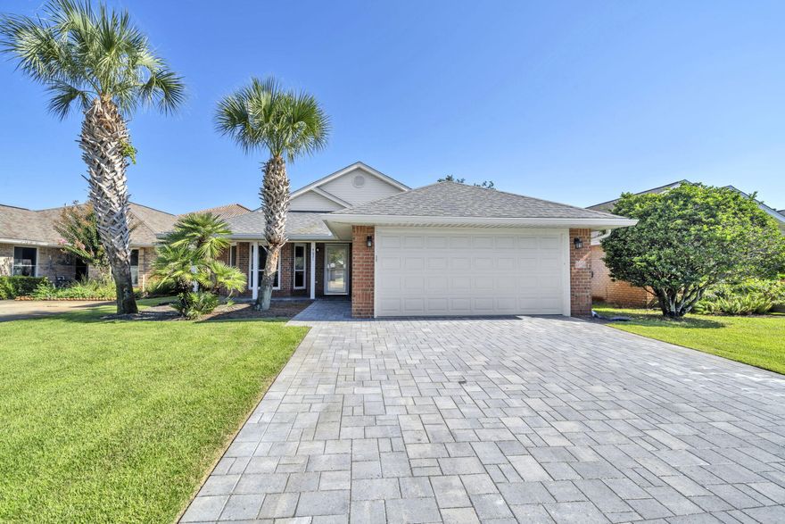 Welcome to this beautifully updated 3 bedroom/2 bath home in the desirable community of Sunsail, located just blocks from Destin's beaches! Meticulously maintained by the same owner for 20 years this home features porcelain tile floors, updated bathrooms and kitchen, fresh interior paint, and a whole-house water filtration system. Large 2-car garage with pavered driveway/ Golf Cart being sold separately.  Step outside to your own private oasis with a new custom swimming pool and privacy fence, gorgeous paver decking and a covered lounge area, perfect for entertaining or relaxing year-round. Large yards that can accommodate a pool are a rarity in Sunsail, making this home a must-see for full-time living, vacation, or investment.