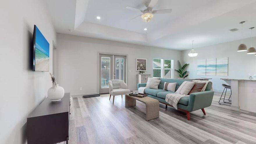 Welcome to 21403 Hilltop Avenue! This exceptional property is located 3 streets from the beach & 8 minutes from Rosemary Beach. With rental projections at $60K per year, this beach home is designed perfectly for rental income. Situated on a large 50x110 lot, the property offers a big front yard, long driveway and deep garage. Spend quality time and relax on the paver back patio which has been equipped with a covered dining and grilling space along with a custom outdoor shower. Inside, the home has been meticulously designed with high-end furnishings and coastal modern finishes. The primary bedroom is a dreamy escape with its natural light, huge walk-in closet and airy primary bathroom. The living room is so welcoming with its raised ceilings and natural light pouring in. The chef's kitchen showcases plenty of cabinet space and high-end appliances. The two guest bedrooms have been beautifully designed and have access to a full bathroom. The laundry area and garage have been customized with extra room for storage. And there is a golf cart in the garage which can convey in the sale. 21403 Hilltop Ave is located in a golf cart-friendly community with no HOA dues. With no HOA, the return on investment for this rental property will be maximized. New construction sales in the community have reached $1.550M & $1.7M. Those sales have substantially increased the value of all neighboring lots, including 21403 Hilltop Avenue. Explore this sanctuary designed for relaxation, connection and unforgettable memories on the coast!