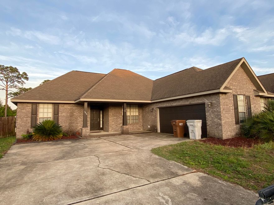 Drive by and see this nice home available now for move in! The front of the house has a side-entry garage, the backyard has a privacy fence and patio. The open floor plan and high ceilings create a spacious area in the living room with a dinette area off the kitchen and a formal dining room or could be a home office space in the entry. The kitchen has a breakfast bar and overlooks the living room. Split floor plan with plenty of walk in closet space in each bedroom!  Easy access to Interstate 10 and 98.  Drive by, call to see inside!