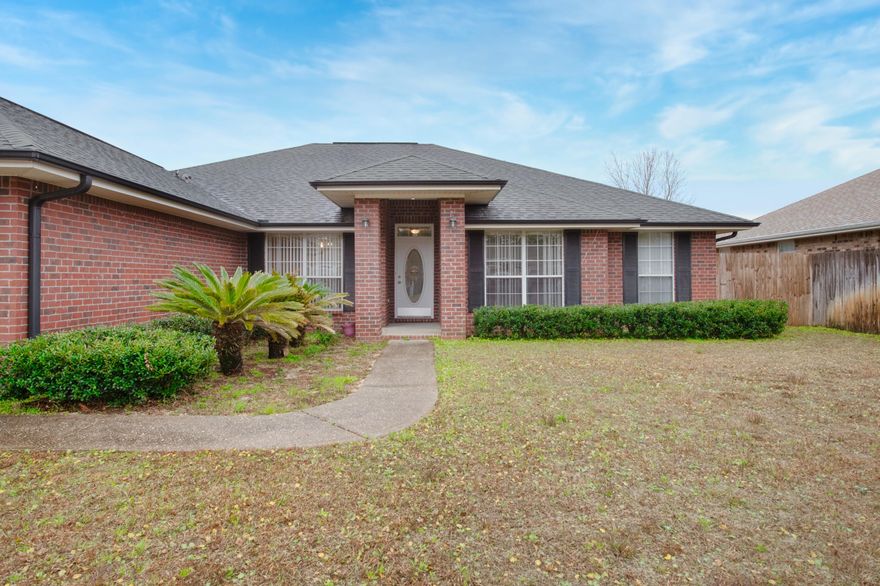 Back Up Offers Being Accepted! Welcome home to this fresh take on 2022! Such a perfect location just far enough from 98 to lose the traffic noise, but easy access via a light.  No HOA! East end of Navarre makes your commute easy!  This fabulous neighborhood home has fresh paint and flooring. The ever-popular split floorplan lines up the large en-suite master behind the great room, and the three spacious bedrooms reside behind the kitchen area. Very roomy closet space!  Fireplace, dining room AND a Den, covered screen porch, and fenced back yard.  Living space galore in this one.  Roof 2004, HVAC 2016, Water Heater 2012. Seller will add new roof with a great offer!!