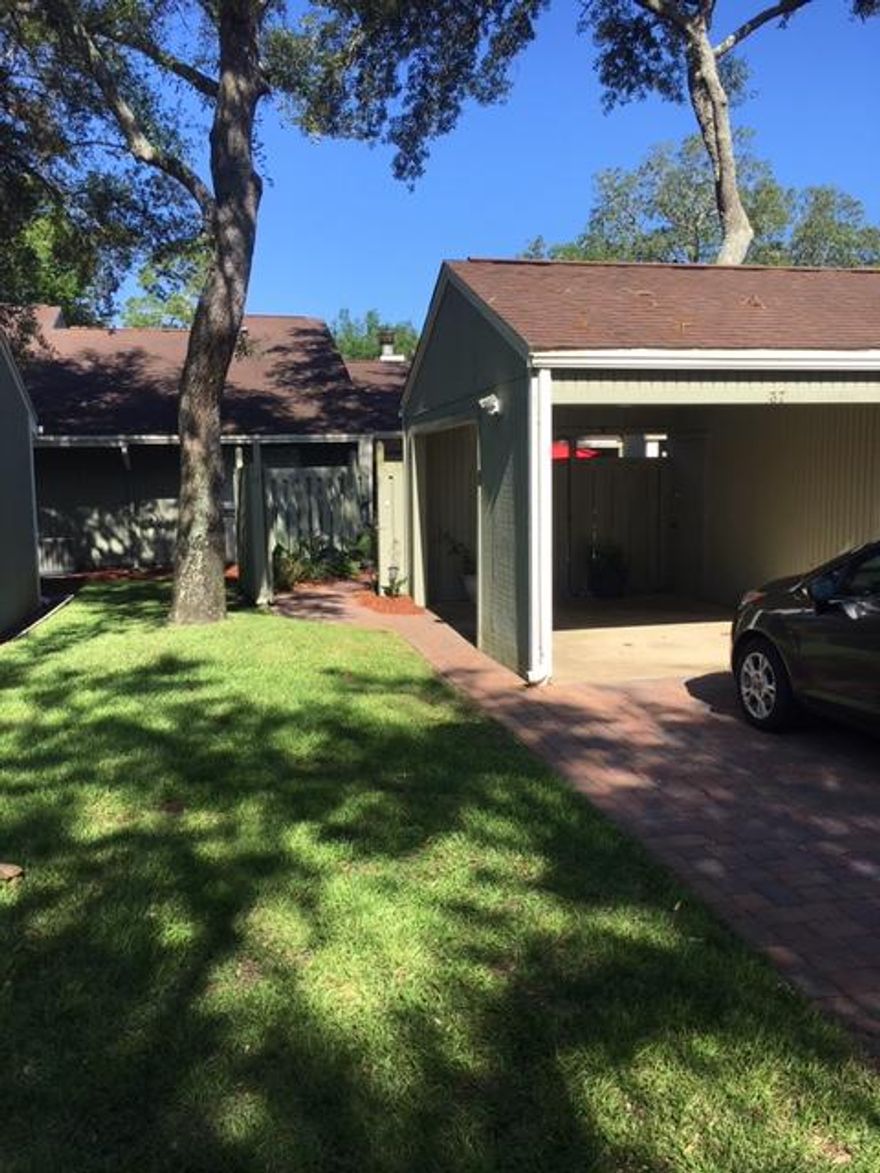 Nice Townhome in the heart of Bluewater Bay There is an inviting courtyard as you enter the privacy fenced entrance from the covered carport/ storage area. The interior is laid out with 2 bedrooms, 2 bathrooms, tiled floors and a spacious kitchen that comes with stainless steel appliances. There is a walk in shower in one bathroom and tub/shower combo in the other. This townhome has been very well cared for an is in ''move in '' condition. There are vaulted ceilings, a wood burning fireplace, nice fixtures and plenty of large windows for natural light throughout the home.There are walk in closets, a breakfast bar, nice wood cabinets, a front storm door and multiple gathering areas to relax. & read or watch your favorite show!Owner will consider small dog only,$300 pet fee & $300 pet depos