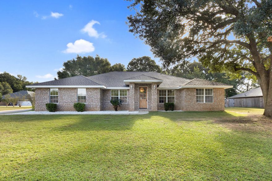 Welcome to 5377 Mountain Laurel Lane -- a beautifully renovated 4-bedroom, 2-bath brick home offering 2,191 square feet of thoughtfully designed living space plus a 217-square-foot enclosed sunroom, a formal dining room, an eat-in kitchen nook, and a versatile front bonus area perfect for an office or flex space. Nestled in a stunning neighborhood on over half an acre, this home sits on a massive lot with plenty of room to spread out and enjoy the outdoors. The property also features an amazing, lofted shed -- perfect for storage, hobbies, or a creative workspace. A new 2025 shingle roof new water heater, 2021 HVAC, and a two-car garage add comfort and value, making this home truly move-in ready. Every inch has been updated to blend modern finishes with timeless comfort. Step inside to Step inside to find vaulted ceilings, luxury vinyl plank flooring, and a cozy living room fireplace that creates a warm, inviting atmosphere. The fully renovated kitchen is a showstopper, featuring white shaker cabinetry, quartz countertops, stainless steel appliances, and a charming breakfast nook  the perfect place to start your mornings. The primary suite provides a relaxing retreat with a dual vanity, separate tub and shower, and sleek flooring that matches the home's fresh design throughout. Enjoy peaceful afternoons in the sunroom or entertain outdoors in the fenced backyard complete with a shed and ample green space for entertaining, gardening, pets, or gatherings. Located in the Berryhill, Hobbs, and Milton school district, this property offers the perfect balance of style, function, and location  just minutes from local parks, shopping, and restaurants. With a full 2025 interior renovation, this stunning home checks every box for today's modern lifestyle.