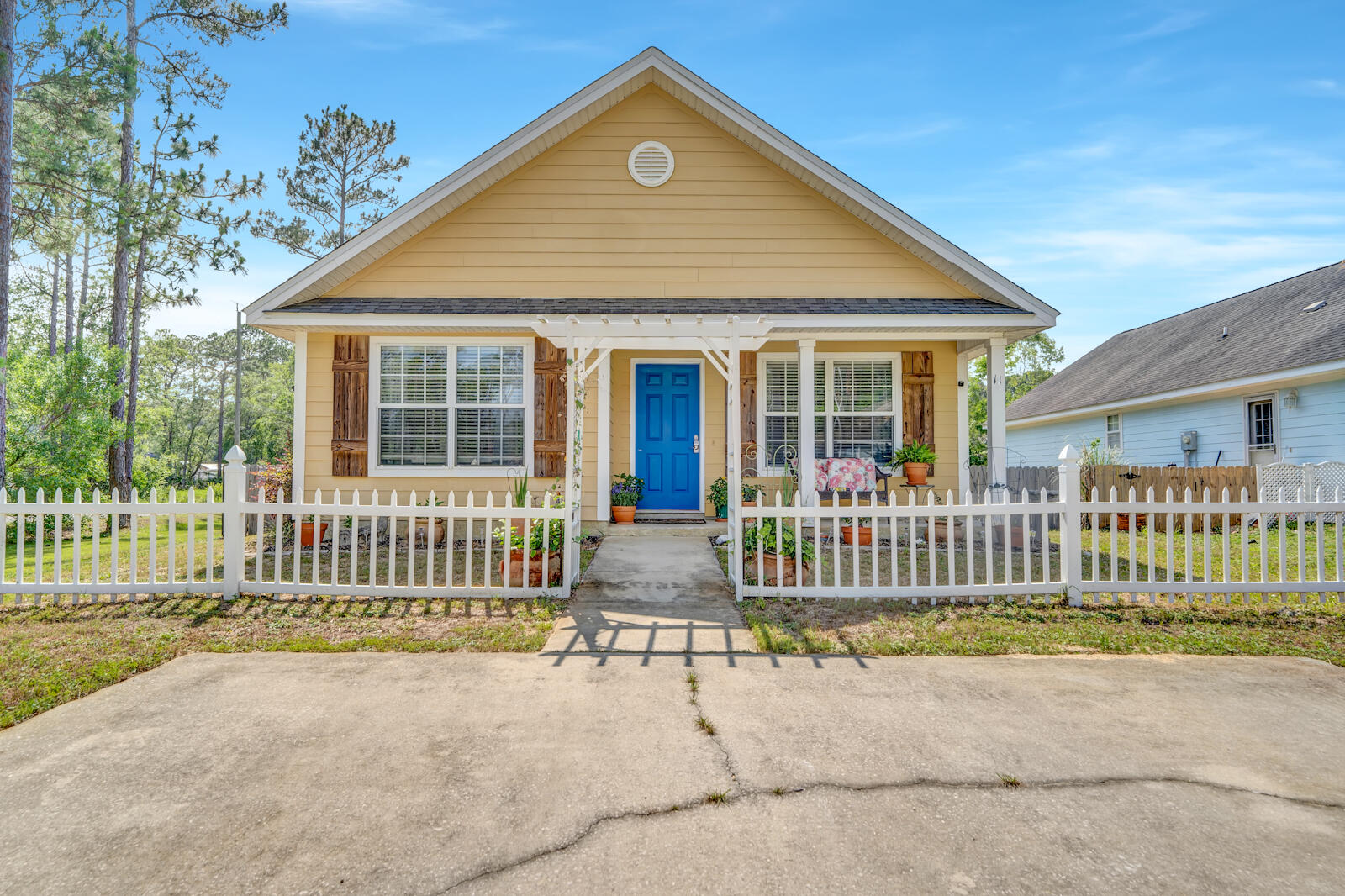 Introducing a remarkable 3 bedroom, 2 bath home situated on a HUGE corner lot, with the added benefit of NO HOA fees! This property offers a prime location, perfectly nestled between the bay and white sandy beaches of 30A, allowing you to indulge in the best of coastal living.Step inside and be captivated by all recent renovations. The kitchen boasts a modern design with updated appliances, sleek countertops, and ample storage space. The bathrooms have been tastefully upgraded, creating a spa-like atmosphere for your relaxation and rejuvenation.Greeted by new LVP flooring, you'll appreciate the seamless flow and contemporary style that encompasses the entire home.