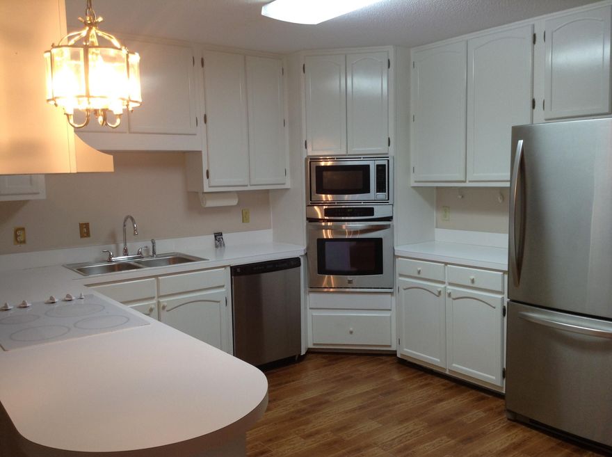 Great townhome conveniently located in the heart of Fort Walton Beach in desirable Donlabrook Gardens. This three bedroom and two bath home has over 2600 square feet of living space. A great floor plan and centrally positioned kitchen make this one to put at the top of your list. The downstairs area has engineered tile that resembles real wood. Most of the kitchen appliances are new. The large Master Bedroom and Bath are downstairs and open to the huge heated and cooled Florida Room. There is a separate dining area and living room on the first floor. The upstairs has a large loft area and the two additional bedrooms that are oversized as well as a full bath. The back yard area has pavers and a privacy fence that opens up to the neighborhood immediately adjacent to Donlabrook Gardens.