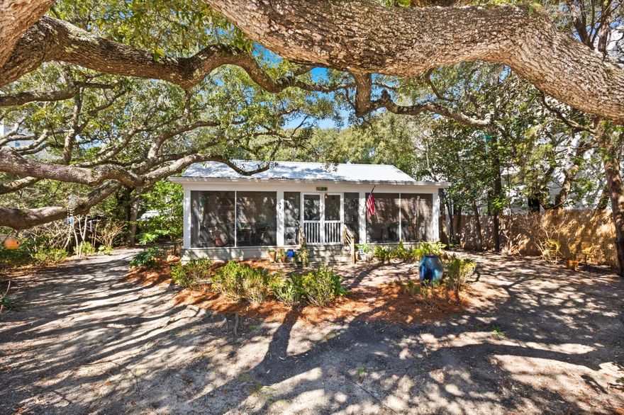 Laid back coastal and eclectic vibes meets unparalleled location. Just 300 feet from an exclusive county beach access, this exceptional property offers effortless entry to one of the area's most pristine and expansive stretches of county owned public beach. Enjoy the luxury of morning walks on the sand, evening sunsets and the soothing sounds of the sea--just a 2 minute walk away from this charming 2-bedroom, 2-bathroom beach cottage  designed for discerning buyers seeking elevated coastal living, this residence presents a rare opportunity to embrace Old Seagrove in an unmatched setting nestled among mature live oaks. Also it is ideally located near Seaside, WaterColor, shopping and top-rated restaurants, it's also perfect for biking around 30A's scenic paths. Enjoy inviting outdoor porches and endless potential - whether you embrace its unique charm, renovate, or build your dream home. A fantastic second home or investment opportunity in one of 30A's most coveted locations!