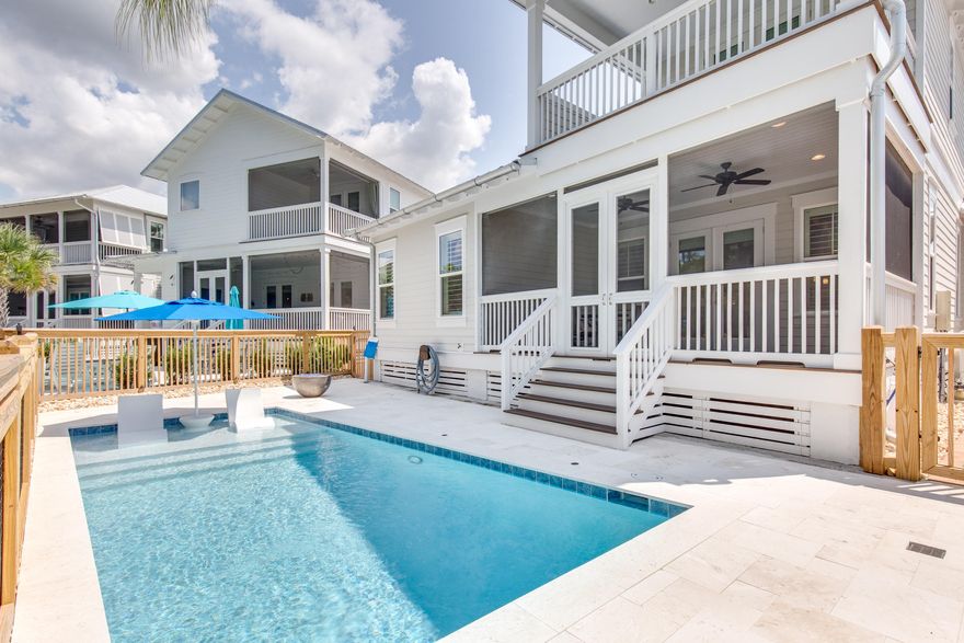 Here it is- your ticket to fun and relaxation!  247 Flatwoods has a rare private pool! Not many homesites in NatureWalk can fit their own private pool.  This triple master suite home is spacious, light and bright and also being sold partially furnished.  Situated on an oversized lot that pies out in the front for extra parking including a carport for those occasional Florida sprinkles.  All the hard work has been done- from designing the backyard oasis to installing a Generac Generator.  2 big front porches allow plenty of room for lounging on a hot summer day. Living/ kitchen/ dining all flow together for the ultimate in entertaining.