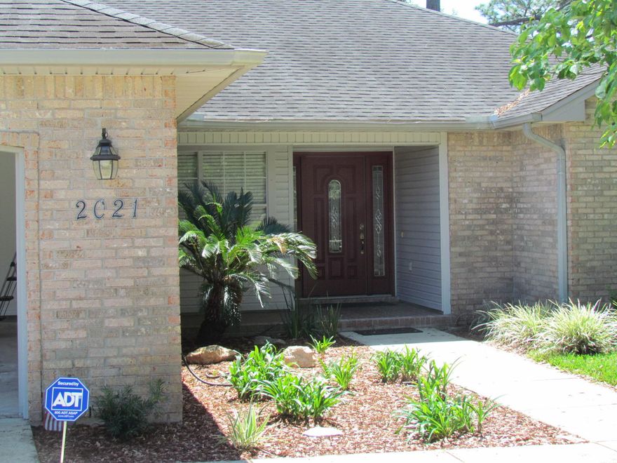 Beautiful family home tucked away on a cul de sac in Rocky Bayou. Three bedrooms and two full baths plus an office with built ins. Kitchen has granite counter tops, tile flooring and is open to the livingroom which boasts laminate flooring and a gas fireplace. Two eating areas, one in the kitchen and a formal dining area at the front of the house. Master has separate tub and shower in the en suite bath as well as a double vanity. Laundry room has large pantry, just off the kitchen. Two car garage with automatic garage door opener, fenced back yard with sprinkler system on a well and owner provides mowing and edging! Enjoy the yard under the pergola covered side patio area or the large brick paver back porch! All this for just $1750/month! Owner will consider a pet with a yearly $250 non re