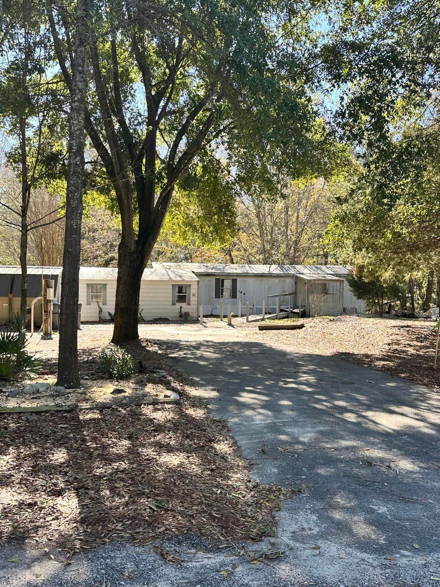 Don't miss this rare canal-front opportunity with 70' of waterfront and direct access to Choctawhatchee Bay! This high-and-dry lot sits in Flood Zone X with no HOA, giving you flexibility to build or bring your RV and enjoy the waterfront lifestyle. This unique property offers paved driveway access, underground utilities (city water & electric), and a large septic system (public sewer coming soon).

Conveniently located just 1.5 miles to the public boat ramp and only 20 minutes to the beach. The existing mobile home has no value and will need removal. A blank slate for your vision.

Affordable waterfront living—priced to sell fast!