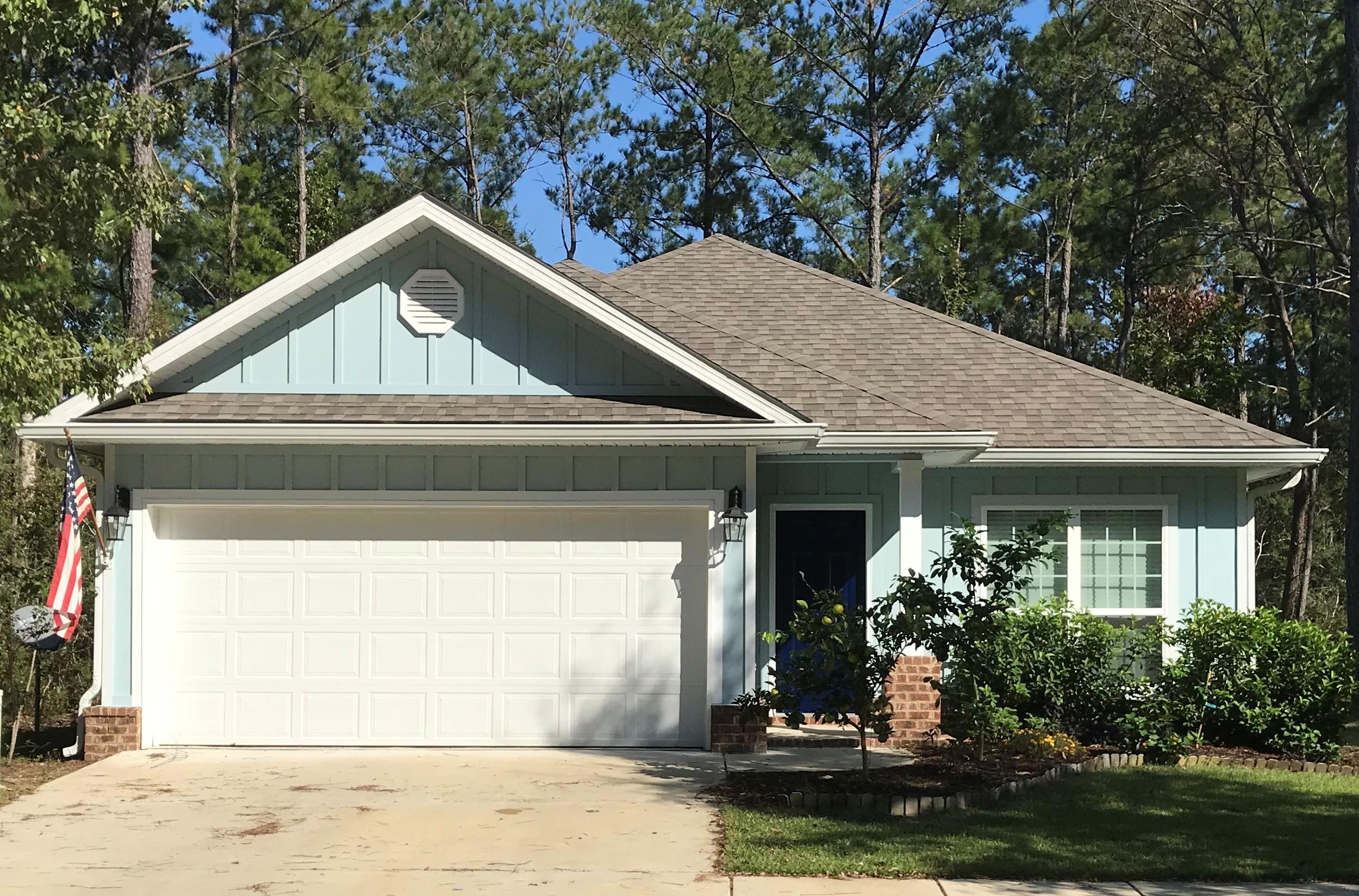 Beautiful two year old 3BR/2BA home in LaGrange Landing. This home features granite countertops and stainless appliances in kitchen. Refrigerator not only has an ice maker but a built in Keurig coffee maker as well! Master Bath with garden tub and walk in closet with extra shelving. Private back yard backs up to community owned wooded acreage. LaGrange Landing amenities include pool, fishing dock, and community path leading to creek which opens into Choctawhatchee Bay for paddle boarding and/or kayaking.