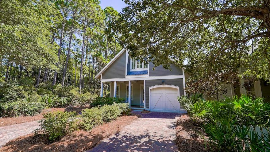Nestled in the coveted gated community of Watersound West Beach, this stunning home sits on a desirable corner lot adjacent to a peaceful wooded area, offering added privacy and serene natural surroundings. Impeccably maintained and never rented, this home is the perfect retreat for both a beachside getaway or a primary residence. From the moment you step inside, you'll be captivated by the warmth of rich Walnut hardwood flooring and the inviting open-concept design. The living room, dining area, and kitchen are bathed in great natural light, creating a bright and welcoming atmosphere. The thoughtfully designed first-floor primary suite offers convenience and comfort, while the beautifully appointed kitchen features custom cabinetry, Wolf and SubZero appliances, and elegant... Cont... finishes that elevate the space. A dry bar adds to the home's functionality, complete with a SubZero under-counter refrigerator and a new Scotsman ice maker.

Upstairs, the home continues to impress with abundant natural light streaming into the versatile loft area, making it an ideal space for a home office or secondary living area. Two well-appointed guest bedrooms and bathrooms complete the second floor, offering comfort and privacy for family and guests. Every detail of this home has been carefully curated to create a truly one-of-a-kind living experience.

Step outside to the expansive rear screened porch, which stretches the width of the home and offers a serene view of the quiet boardwalk, perfect for relaxing and embracing the coastal breeze.

Watersound West Beach is a sought-after boutique community spanning 66 acres with only 199 homesites. With deeded beach access, a welcoming mix of full-time and part-time residents, and no short-term rental restrictions, this neighborhood provides an unparalleled coastal lifestyle.

Don't miss the opportunity to own this exceptional home in one of 30A's most desirable communities!