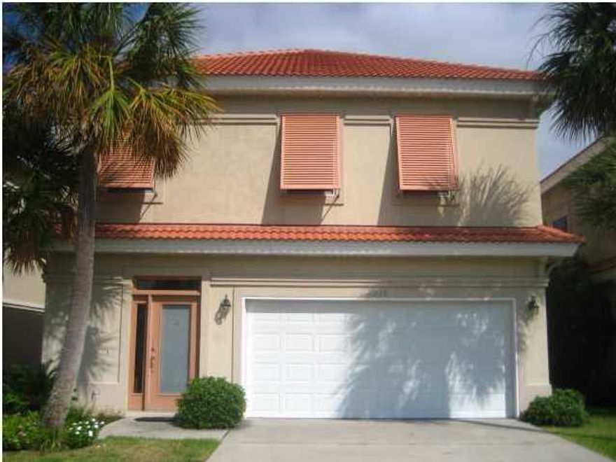 Lovely home ~ great location in the heart of Destin ~ in a gated community! 3 bedrooms and 2 1/2 baths upstairs and an open floor plan downstairs! All new stainless steel kitchen appliances, tile flooring, glass sliding doors open onto a covered patio with privacy fenced backyard. New AC units, sprinkler system, and a 2 car garage. Large master bedroom and bath with his & her walk-in closets and a screened balcony off master bedroom. Community Pool.