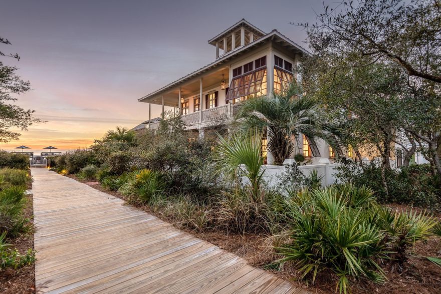 Situated just one home off the Gulf along quiet Boardwalk D in Rosemary Beach, this Southern-style beach cottage offers picturesque Gulf views. Quality construction by Ficarra Builders, the Main House, Carriage House, and courtyard with private pool sit on one of the larger lots in Rosemary Beach. Spacious, covered balconies face the Gulf on both the first and second levels, with an outdoor fireplace on the upstairs porch, and the top floor covered tower offers panoramic Gulf views. With solid Mahogany doors, custom Marvin windows, hand-turned interior and exterior wood, and wrap around balconies make this a timeless Rosemary Beach home.