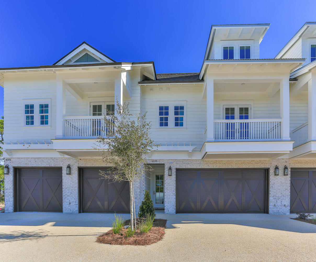 The Brownstones at Kelly Plantation offer twenty-three unique Florida style Brownstones. This beautiful 2 1/2 story end unit Brownstone is located in the E building. This home is a 3 bedroom 2 1/2 bath plan with two bedrooms located on the entry level with laundry room and 9'celings. The second level has 10' ceilings with the master bedroom, kitchen, dining area and great room that opens up to a large porch with nature preserve views. The 3rd floor bonus room can be used as a game room, additional storage or office. The private 2-car garage offers security, convenience, and plenty of storage. The maintenance-free lifestyle allows maximum enjoyment of your home's luxurious finishes, beautiful surroundings and all the benefits of living within the gates of Kelly Plantation.